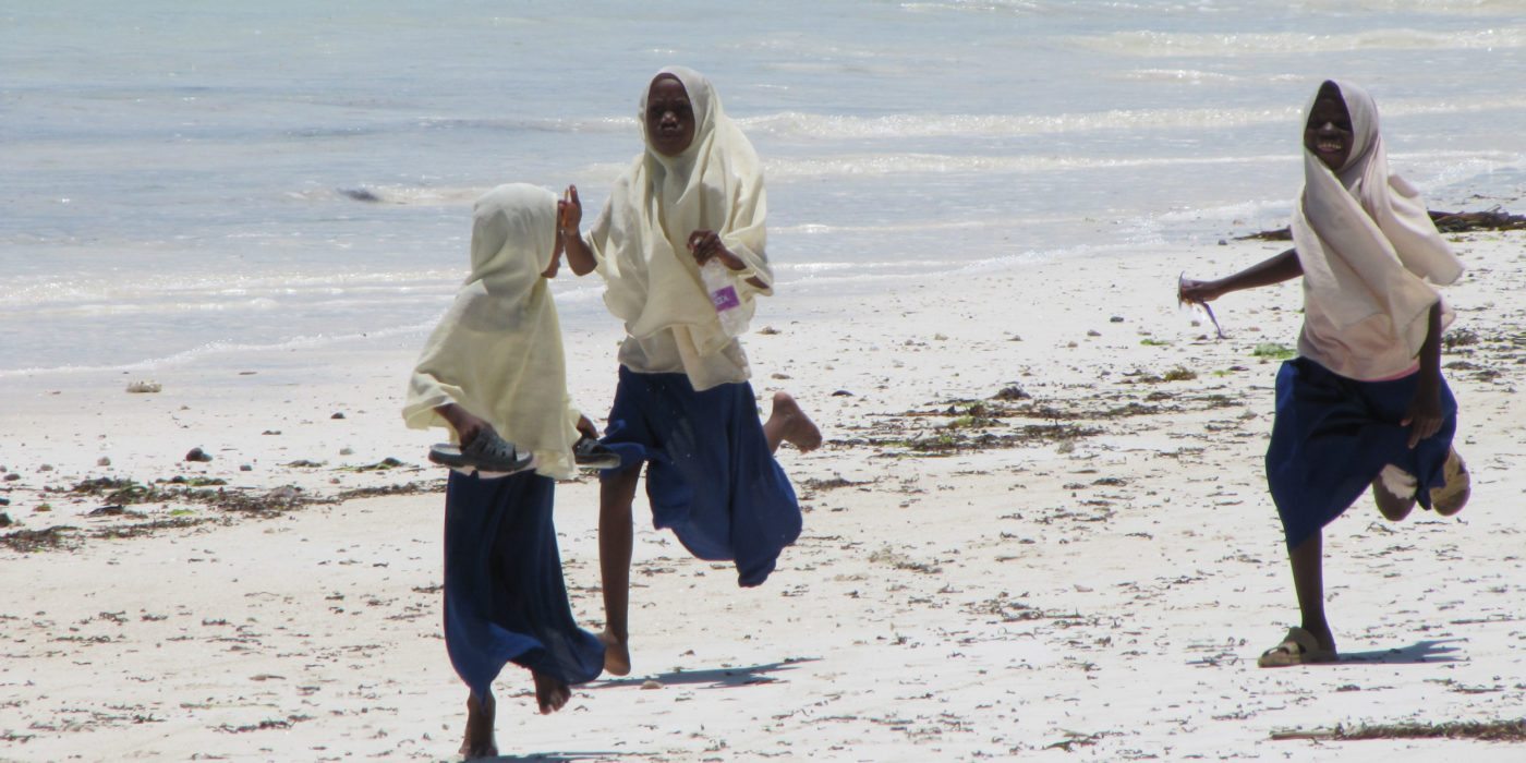 Girls-playing-tag-Zanzibar-Tanzania