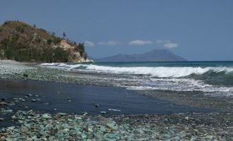 Kelimutu-Black-Sand-Beach-with-Stones-Indonesia