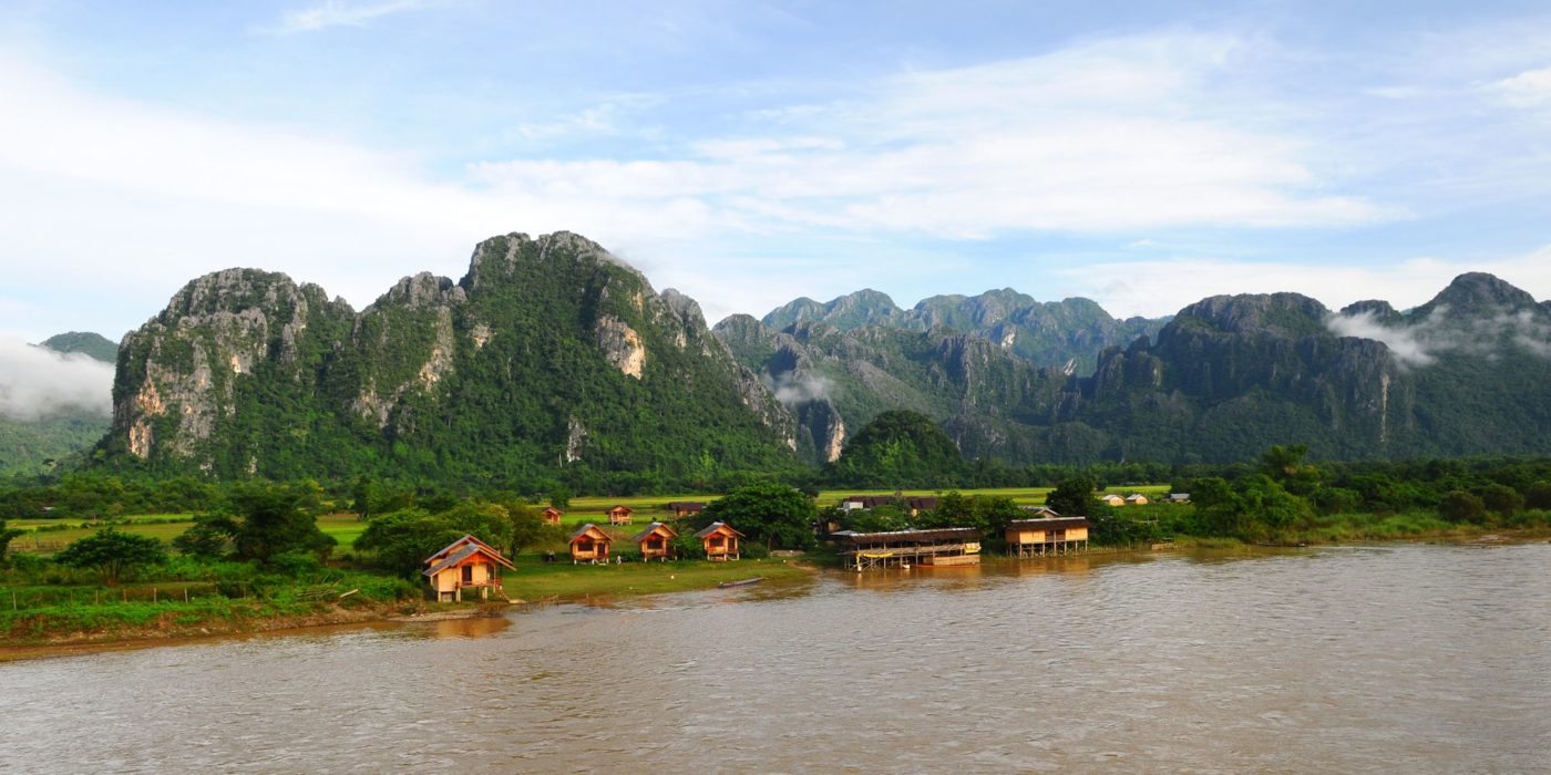 Laos_river_temple_mountains