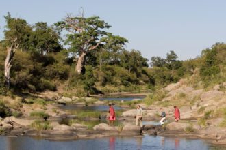 Rekero-camp-crossing-river-kenya