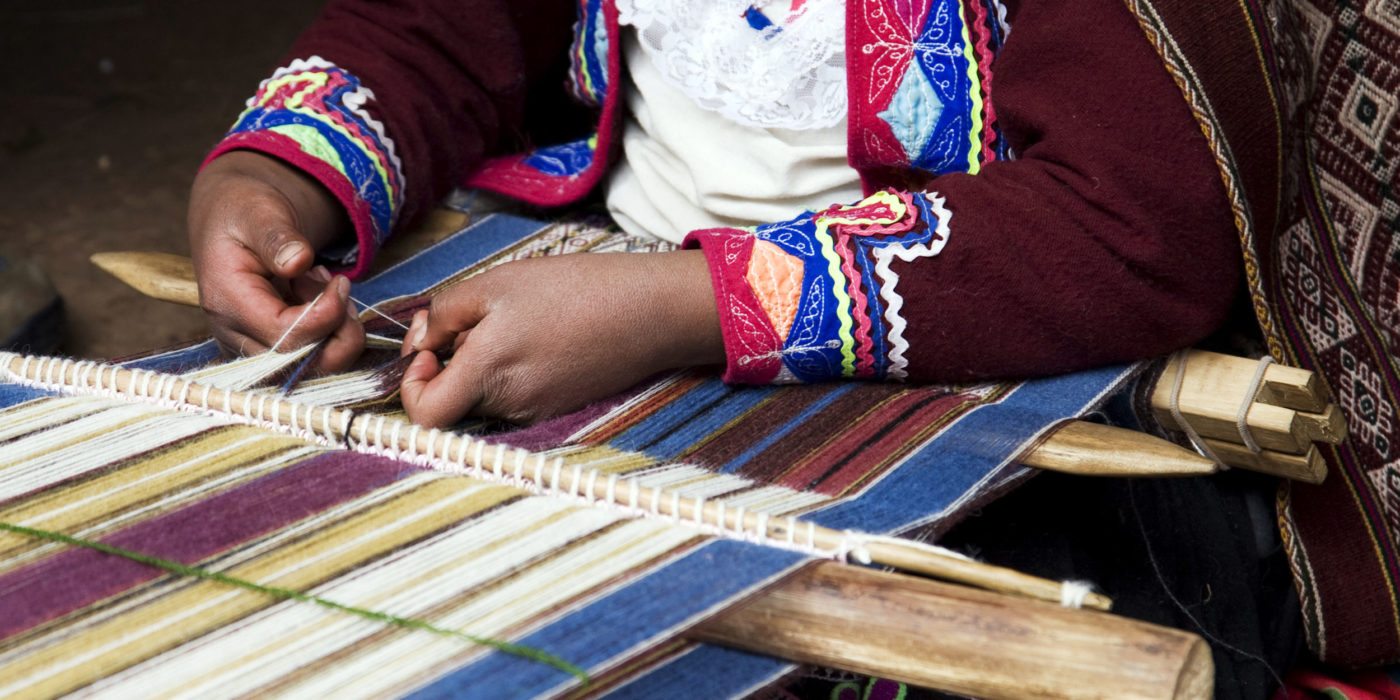 Peruvian-Indian-Woman-in-Traditional-Dress-Weaving